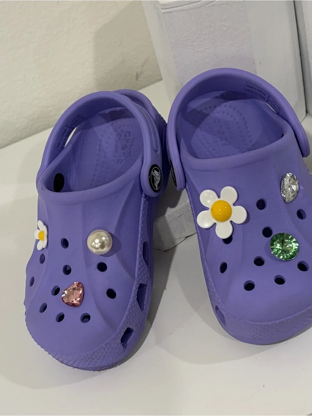Girls size 9 toddler. Purple CROCS  Great Condition! Charms included